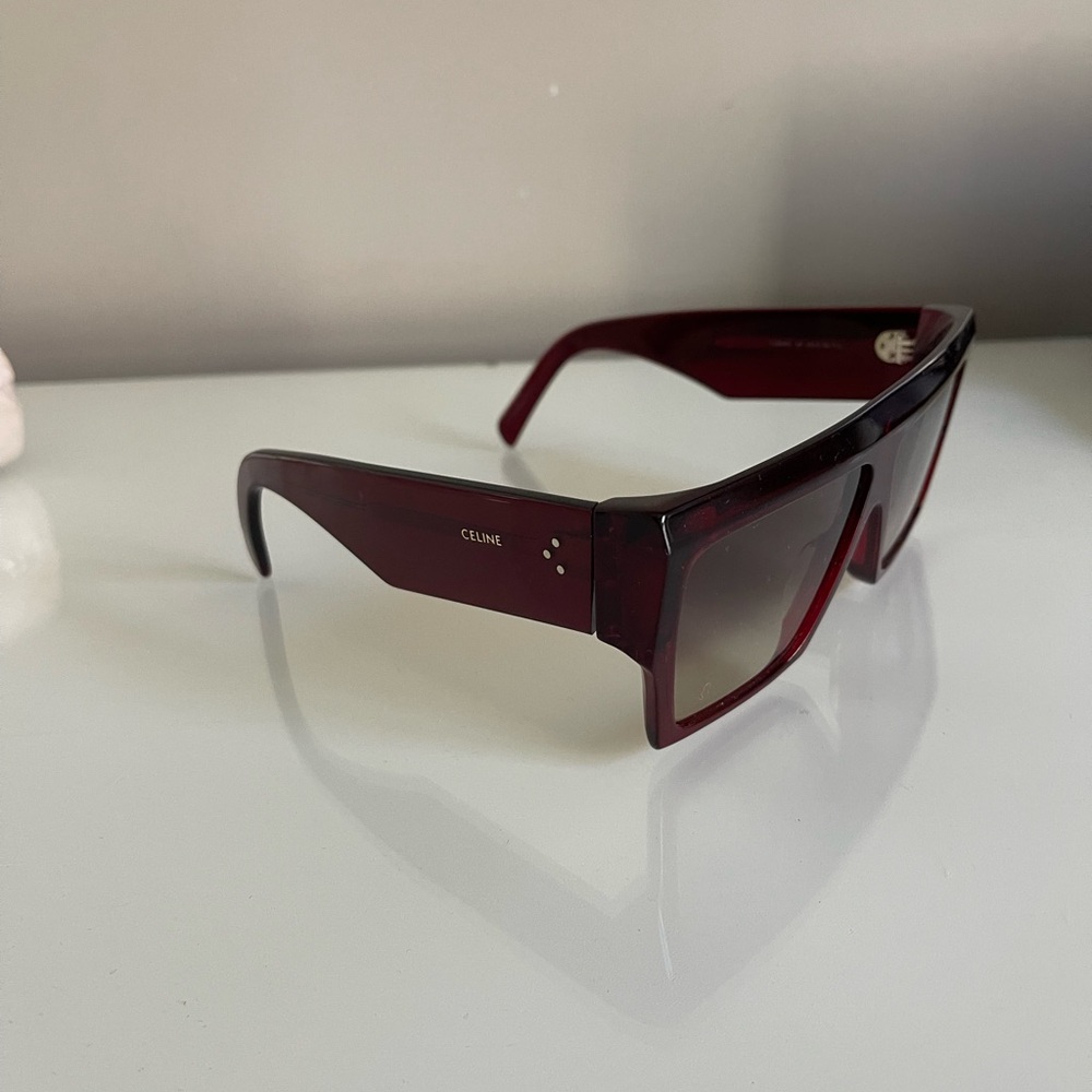 Red Celine shield sunglasses.